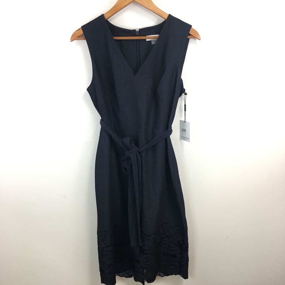 NWT Calvin Klein sheath dress with floral embroidery and cut out hem
